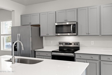 The Givens offers a beautifully crafted two-story design that on Harbour Point Golf Club in North Carolina - for sale on GolfHomes.com, golf home, golf lot