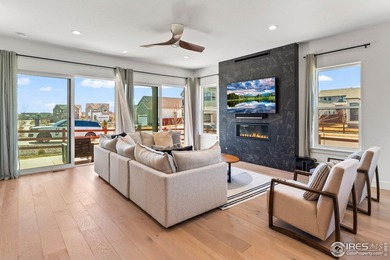 Situated on a premium corner lot with open views, in the heart on Raindance National Golf Course in Colorado - for sale on GolfHomes.com, golf home, golf lot