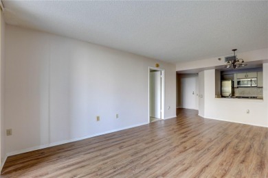 Perched on the top floor of Crystal Bay, this fourth-story condo on Feather Sound Country Club in Florida - for sale on GolfHomes.com, golf home, golf lot