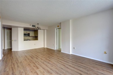 Perched on the top floor of Crystal Bay, this fourth-story condo on Feather Sound Country Club in Florida - for sale on GolfHomes.com, golf home, golf lot