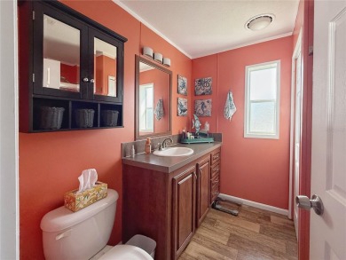 Were you searching for a WATERFRONT HOME with an 8,000 lb BOAT on Apollo Beach Golf and Sea Club in Florida - for sale on GolfHomes.com, golf home, golf lot