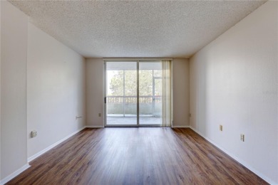 Perched on the top floor of Crystal Bay, this fourth-story condo on Feather Sound Country Club in Florida - for sale on GolfHomes.com, golf home, golf lot
