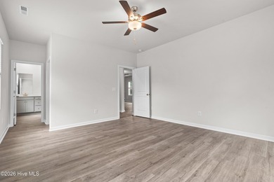 The Givens offers a beautifully crafted two-story design that on Harbour Point Golf Club in North Carolina - for sale on GolfHomes.com, golf home, golf lot