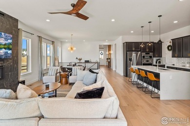 Situated on a premium corner lot with open views, in the heart on Raindance National Golf Course in Colorado - for sale on GolfHomes.com, golf home, golf lot