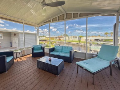 Were you searching for a WATERFRONT HOME with an 8,000 lb BOAT on Apollo Beach Golf and Sea Club in Florida - for sale on GolfHomes.com, golf home, golf lot