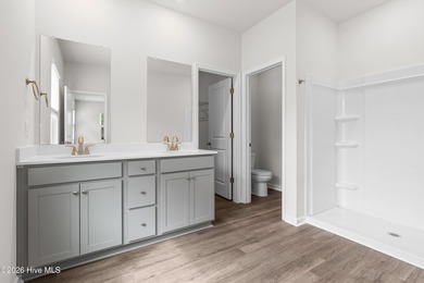 The Givens offers a beautifully crafted two-story design that on Harbour Point Golf Club in North Carolina - for sale on GolfHomes.com, golf home, golf lot