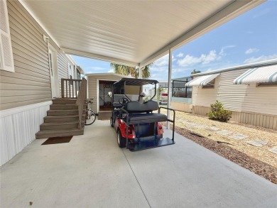 Were you searching for a WATERFRONT HOME with an 8,000 lb BOAT on Apollo Beach Golf and Sea Club in Florida - for sale on GolfHomes.com, golf home, golf lot