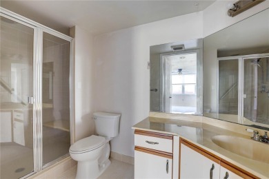 Perched on the top floor of Crystal Bay, this fourth-story condo on Feather Sound Country Club in Florida - for sale on GolfHomes.com, golf home, golf lot