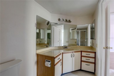 Perched on the top floor of Crystal Bay, this fourth-story condo on Feather Sound Country Club in Florida - for sale on GolfHomes.com, golf home, golf lot