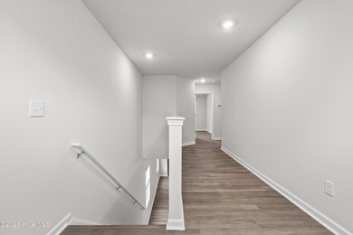 The Givens offers a beautifully crafted two-story design that on Harbour Point Golf Club in North Carolina - for sale on GolfHomes.com, golf home, golf lot