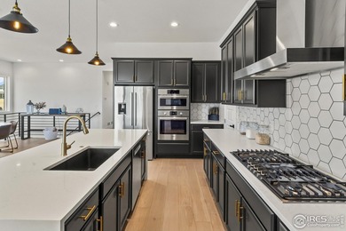 Situated on a premium corner lot with open views, in the heart on Raindance National Golf Course in Colorado - for sale on GolfHomes.com, golf home, golf lot