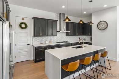 Situated on a premium corner lot with open views, in the heart on Raindance National Golf Course in Colorado - for sale on GolfHomes.com, golf home, golf lot