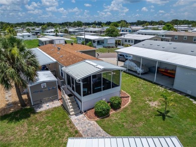 Were you searching for a WATERFRONT HOME with an 8,000 lb BOAT on Apollo Beach Golf and Sea Club in Florida - for sale on GolfHomes.com, golf home, golf lot