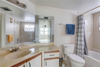 Perched on the top floor of Crystal Bay, this fourth-story condo on Feather Sound Country Club in Florida - for sale on GolfHomes.com, golf home, golf lot