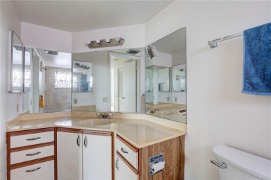 Perched on the top floor of Crystal Bay, this fourth-story condo on Feather Sound Country Club in Florida - for sale on GolfHomes.com, golf home, golf lot