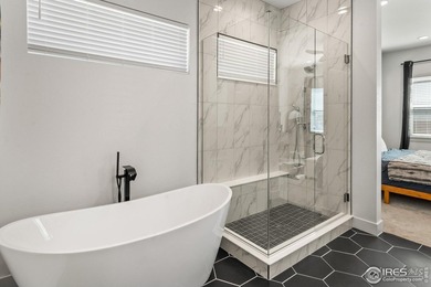 Situated on a premium corner lot with open views, in the heart on Raindance National Golf Course in Colorado - for sale on GolfHomes.com, golf home, golf lot