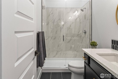 Situated on a premium corner lot with open views, in the heart on Raindance National Golf Course in Colorado - for sale on GolfHomes.com, golf home, golf lot