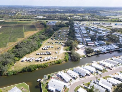 Were you searching for a WATERFRONT HOME with an 8,000 lb BOAT on Apollo Beach Golf and Sea Club in Florida - for sale on GolfHomes.com, golf home, golf lot