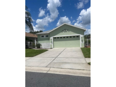 Welcome to this 3 Bedroom  2 Bath Courtyard Home WITH GOLF CART on The Groves Golf and Country Club in Florida - for sale on GolfHomes.com, golf home, golf lot