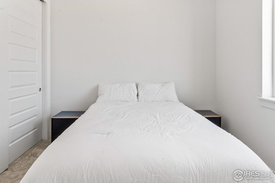 Situated on a premium corner lot with open views, in the heart on Raindance National Golf Course in Colorado - for sale on GolfHomes.com, golf home, golf lot