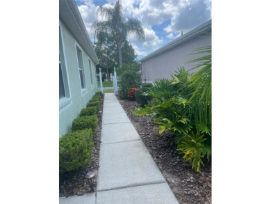 Welcome to this 3 Bedroom  2 Bath Courtyard Home WITH GOLF CART on The Groves Golf and Country Club in Florida - for sale on GolfHomes.com, golf home, golf lot