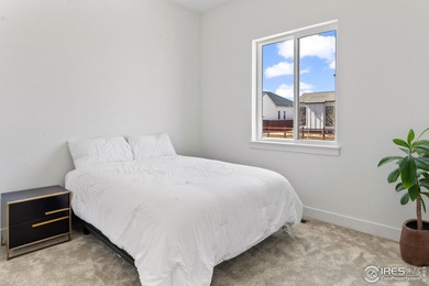 Situated on a premium corner lot with open views, in the heart on Raindance National Golf Course in Colorado - for sale on GolfHomes.com, golf home, golf lot