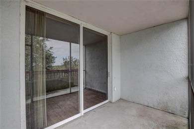Perched on the top floor of Crystal Bay, this fourth-story condo on Feather Sound Country Club in Florida - for sale on GolfHomes.com, golf home, golf lot
