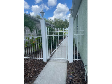 Welcome to this 3 Bedroom  2 Bath Courtyard Home WITH GOLF CART on The Groves Golf and Country Club in Florida - for sale on GolfHomes.com, golf home, golf lot