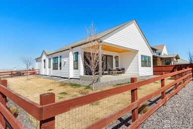 Situated on a premium corner lot with open views, in the heart on Raindance National Golf Course in Colorado - for sale on GolfHomes.com, golf home, golf lot