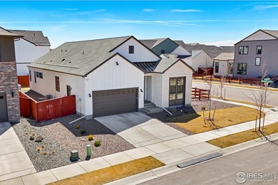 Situated on a premium corner lot with open views, in the heart on Raindance National Golf Course in Colorado - for sale on GolfHomes.com, golf home, golf lot