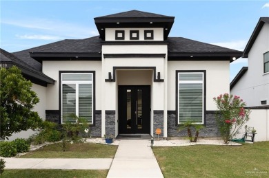 Experience the pinnacle of upscale living in this exquisite on Los Lagos Golf Club in Texas - for sale on GolfHomes.com, golf home, golf lot