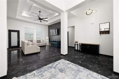 Experience the pinnacle of upscale living in this exquisite on Los Lagos Golf Club in Texas - for sale on GolfHomes.com, golf home, golf lot