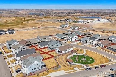 Situated on a premium corner lot with open views, in the heart on Raindance National Golf Course in Colorado - for sale on GolfHomes.com, golf home, golf lot