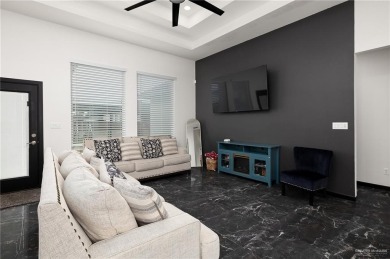 Experience the pinnacle of upscale living in this exquisite on Los Lagos Golf Club in Texas - for sale on GolfHomes.com, golf home, golf lot