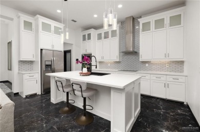 Experience the pinnacle of upscale living in this exquisite on Los Lagos Golf Club in Texas - for sale on GolfHomes.com, golf home, golf lot