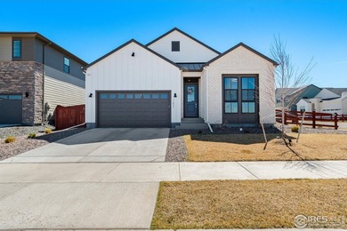 Situated on a premium corner lot with open views, in the heart on Raindance National Golf Course in Colorado - for sale on GolfHomes.com, golf home, golf lot