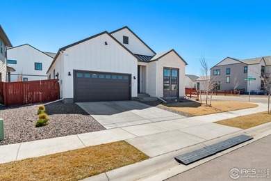 Situated on a premium corner lot with open views, in the heart on Raindance National Golf Course in Colorado - for sale on GolfHomes.com, golf home, golf lot