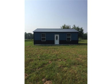 Beautiful flat lot at Sugar Valley Lakes, Mound City, KS for sale on GolfHomes.com