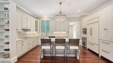 Experience the charm of this original Bo MacEwen-designed home on The Oaks Club in Florida - for sale on GolfHomes.com, golf home, golf lot