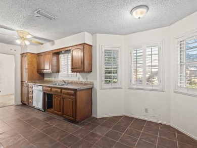 This three-bedroom, two-bathroom home is brimming with potential on Hillsboro Country Club in Texas - for sale on GolfHomes.com, golf home, golf lot