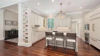 Experience the charm of this original Bo MacEwen-designed home on The Oaks Club in Florida - for sale on GolfHomes.com, golf home, golf lot