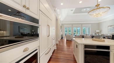 Experience the charm of this original Bo MacEwen-designed home on The Oaks Club in Florida - for sale on GolfHomes.com, golf home, golf lot