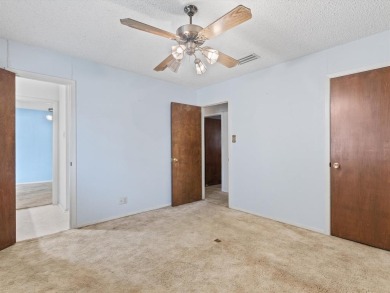 This three-bedroom, two-bathroom home is brimming with potential on Hillsboro Country Club in Texas - for sale on GolfHomes.com, golf home, golf lot