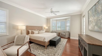 Experience the charm of this original Bo MacEwen-designed home on The Oaks Club in Florida - for sale on GolfHomes.com, golf home, golf lot