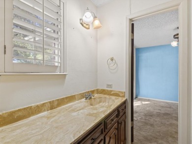 This three-bedroom, two-bathroom home is brimming with potential on Hillsboro Country Club in Texas - for sale on GolfHomes.com, golf home, golf lot