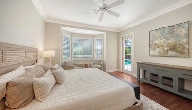 Experience the charm of this original Bo MacEwen-designed home on The Oaks Club in Florida - for sale on GolfHomes.com, golf home, golf lot