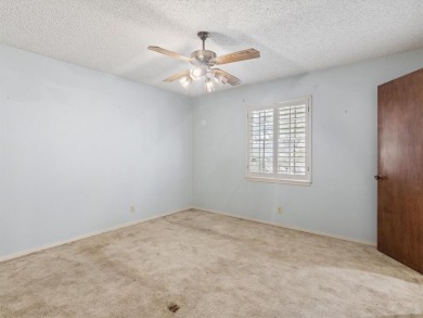 This three-bedroom, two-bathroom home is brimming with potential on Hillsboro Country Club in Texas - for sale on GolfHomes.com, golf home, golf lot
