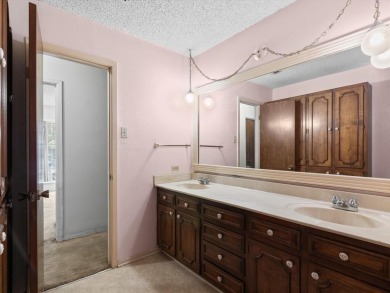 This three-bedroom, two-bathroom home is brimming with potential on Hillsboro Country Club in Texas - for sale on GolfHomes.com, golf home, golf lot