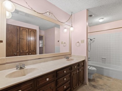 This three-bedroom, two-bathroom home is brimming with potential on Hillsboro Country Club in Texas - for sale on GolfHomes.com, golf home, golf lot