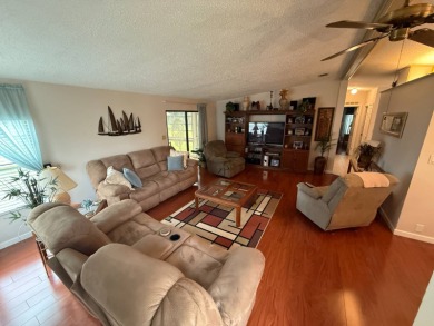 This well-cared for 2-bedroom, 2-bathroom Palm Harbor Home is on Del Tura Golf and Country Club in Florida - for sale on GolfHomes.com, golf home, golf lot